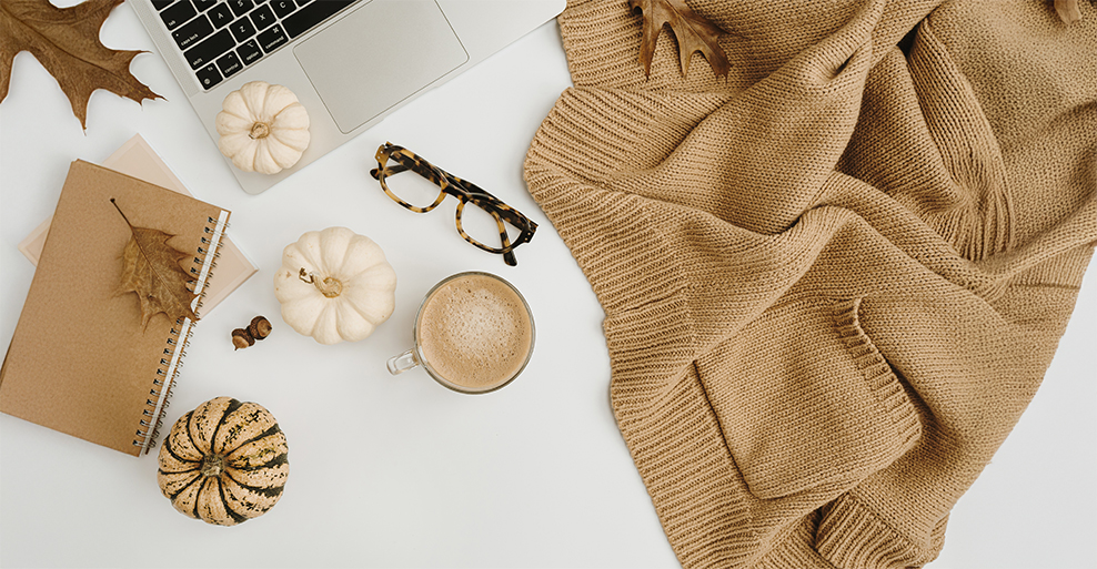 Woman styling prescription glasses with fall autumn outfits